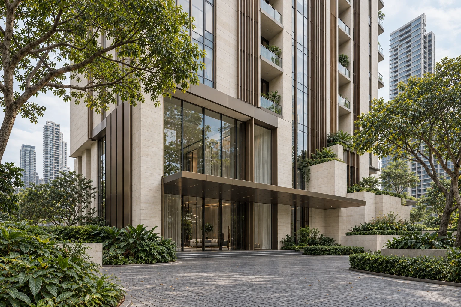 Luxury Bangkok condominium with a stone-and-bronze facade and landscaped entrance.