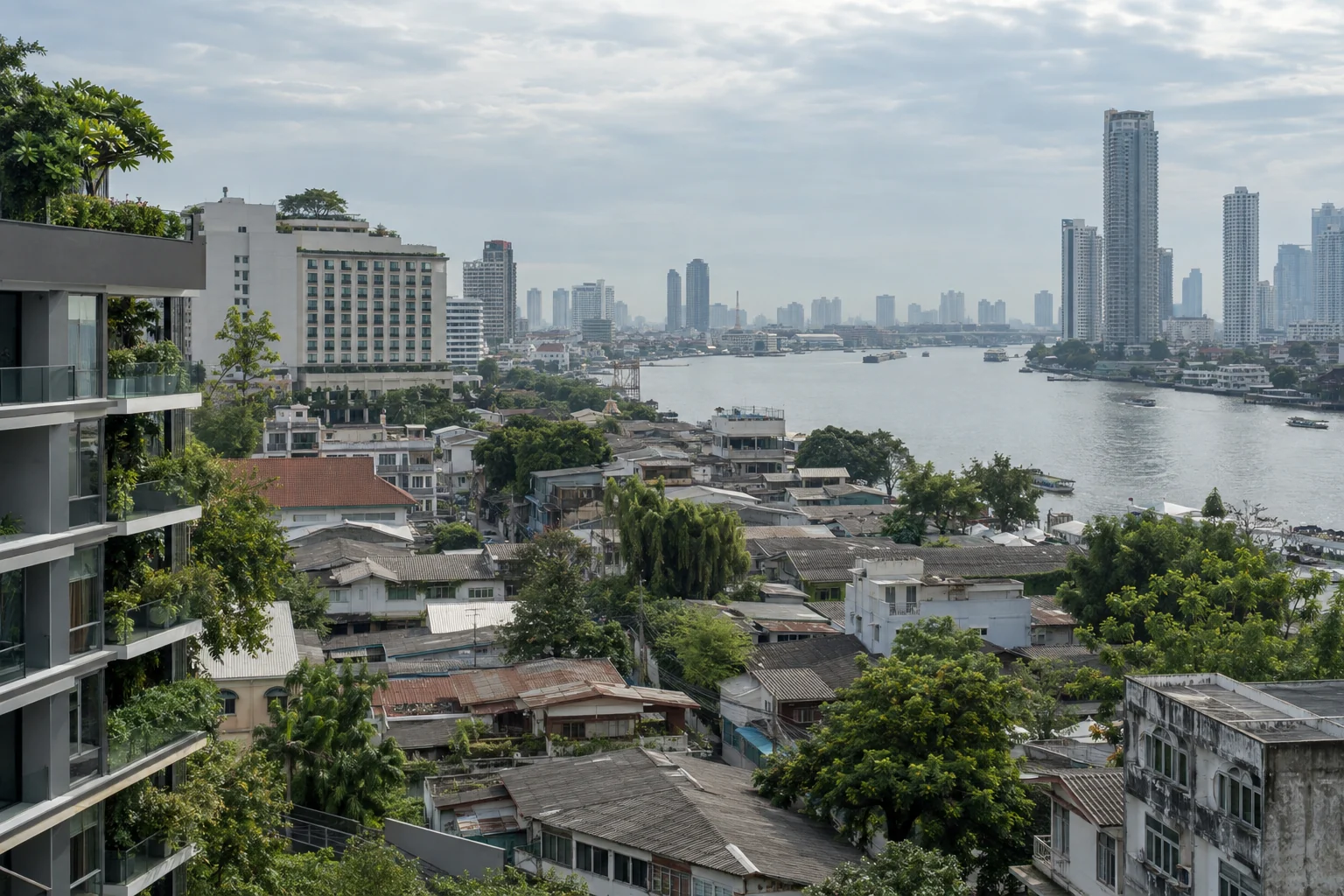 Bangkok riverfront with condominiums, commercial buildings and the surrounding neighbourhood.